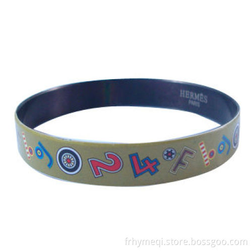 Stainless steel bangle with stoving varnish